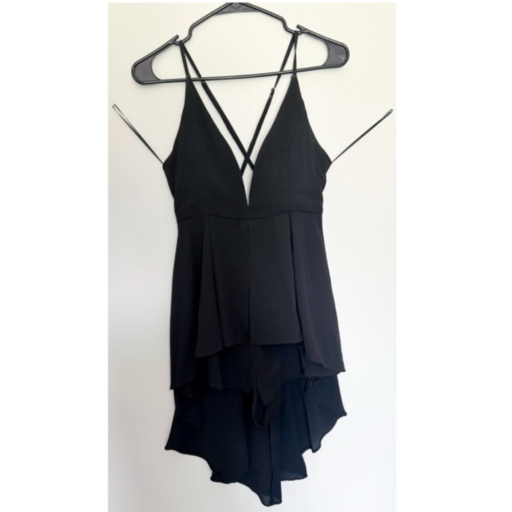 deep plunging neck. high low romper dress. new with tags size medium